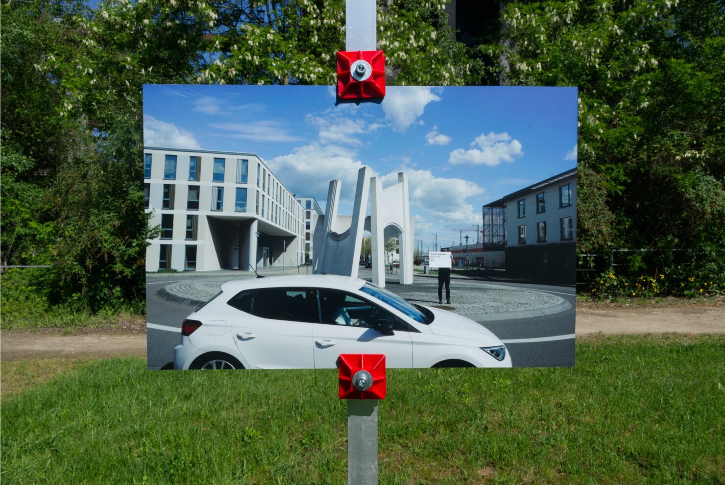 Matthieu Martin, Kreisverkehr, monumental artwork label deployed near public sculpture, Völklingen region, 2026